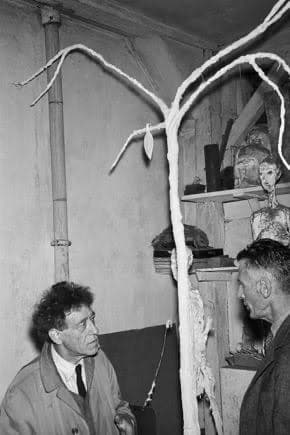 Samuel Beckett and Alberto Giacometti in the studio with the plaster tree