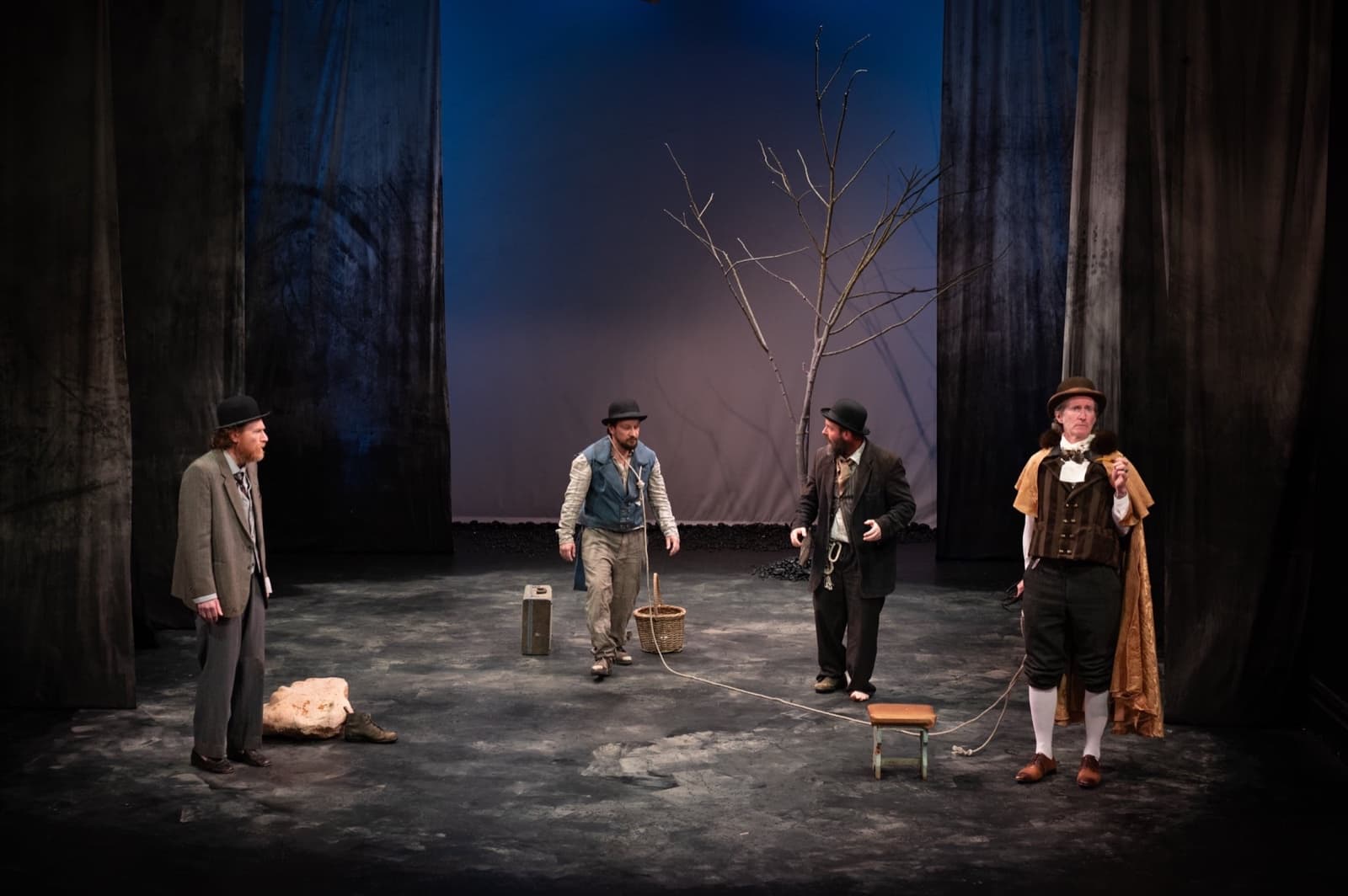 Vladimir, Lucky, Estragon and Pozzo spread across the stage